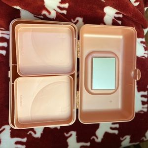 Small Rose Gold Kaboodle with “Jenna” label on it